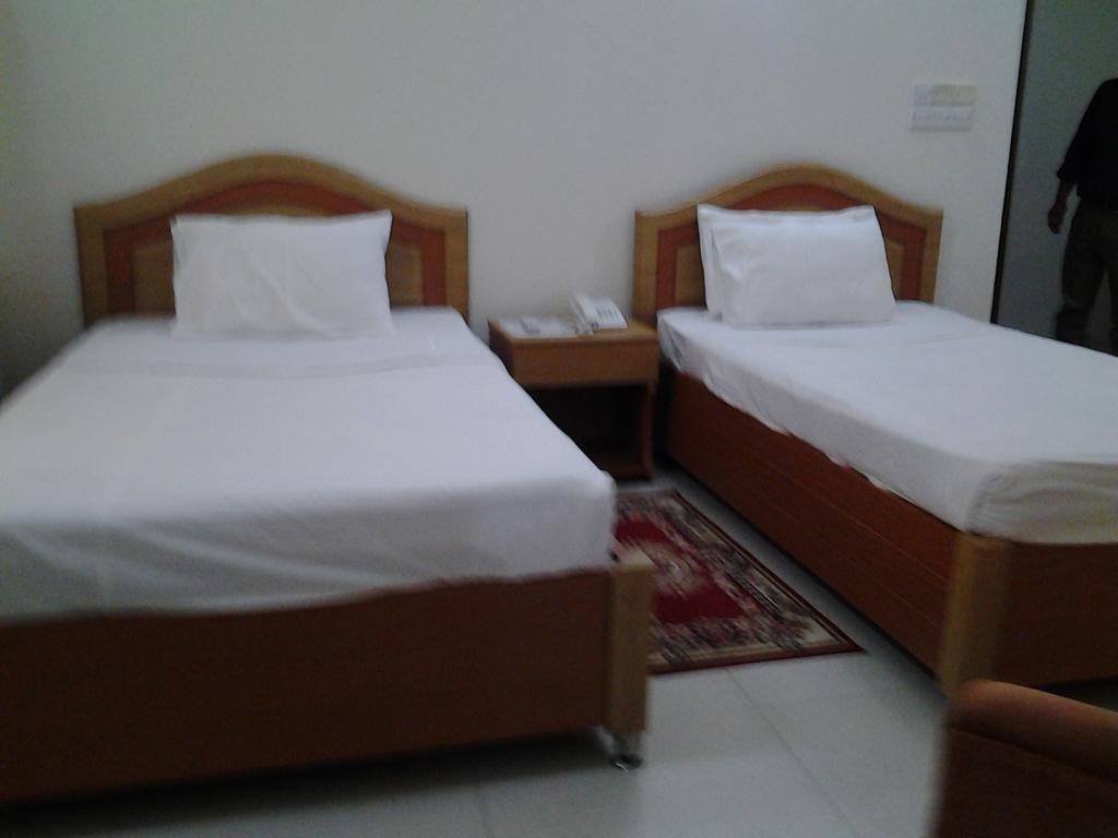 Hotel Afford Inn Dhaka Zimmer foto